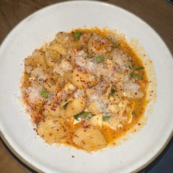 The Quinte Oyster Bar - Shells + seafood ragu - Cocktail Bars Near Me - Charleston, South Carolina