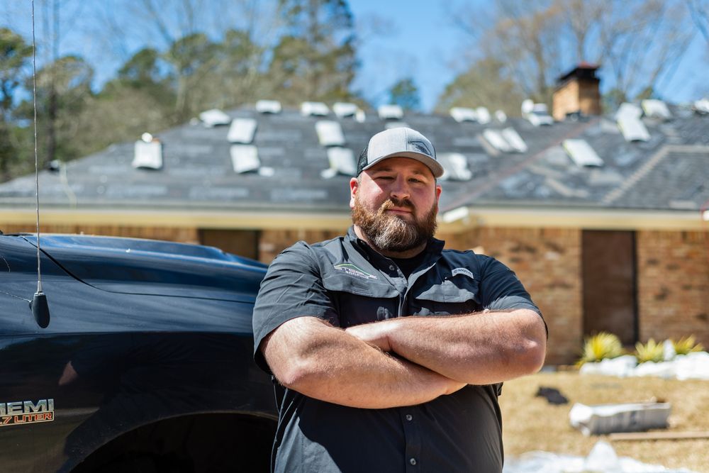Slide of Steele Roofing