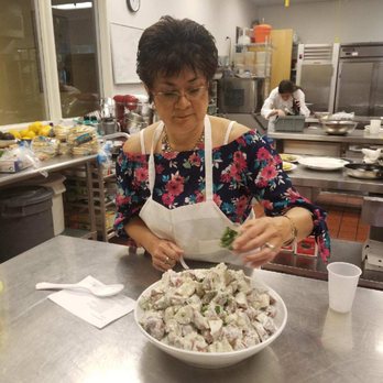 Classic Cooking - Finishing touch of basil on the red potato salad - Cooking Schools Near Me - Scottsdale, Arizona