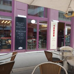 Sitting outside looking into their restaurant