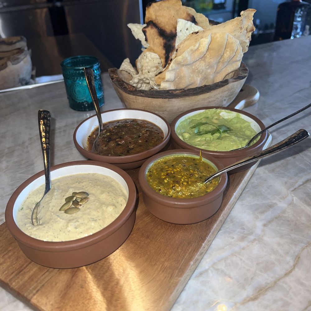 Mirra - This sampler plate, the Mirra Mezze, included some interesting dips- some of which were smoky, some citrus-y, all of which were yummy! - Mexican Near Me - Chicago, Illinois Mirra - This sampler plate, the Mirra Mezze, included some interesting dips- some of which were smoky, some citrus-y, all of which were yummy! - Mexican Near Me - Chicago, Illinois