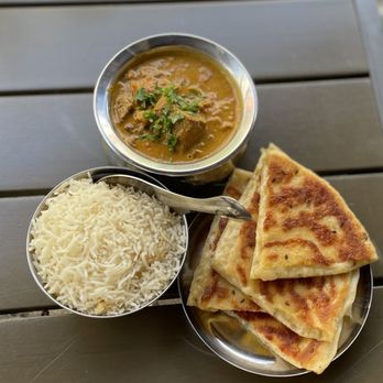 Ghee Indian Kitchen - Kerala lamb (top, comes with rice), ghost pepper naan - Indian Near Me - Miami, Florida Ghee Indian Kitchen - Kerala lamb (top, comes with rice), ghost pepper naan - Indian Near Me - Miami, Florida