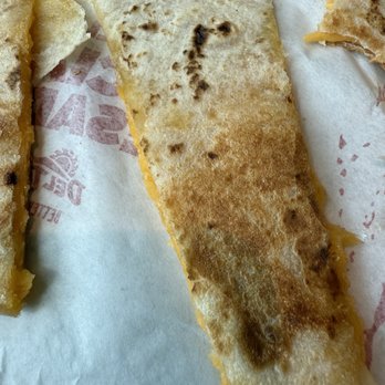 Del Taco - A flower tortilla with a tiny bit of cheese. A sorry food. - Mexican Near Me - Fullerton, California Del Taco - A flower tortilla with a tiny bit of cheese. A sorry food. - Mexican Near Me - Fullerton, California