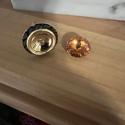 Buy4LessTuxedo - The "gem" in the cuff link popped out as soon as I took it out of the package.