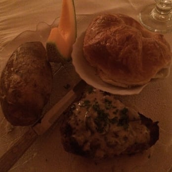 Mary's Restaurant - The 8oz filet with a mushroom/cognac sauce, baked potato, croissant, and a slice of cantaloupe. - New American Near Me - Herrin, Illinois Mary's Restaurant - The 8oz filet with a mushroom/cognac sauce, baked potato, croissant, and a slice of cantaloupe. - New American Near Me - Herrin, Illinois