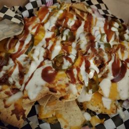 Small pork nachos. Very tasty! Small pork nachos. Very tasty!