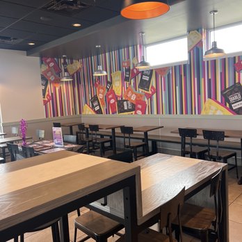 Taco Bell - tables and chairs in a restaurant - Fast Food Near Me - Fraser, Michigan Taco Bell - tables and chairs in a restaurant - Fast Food Near Me - Fraser, Michigan