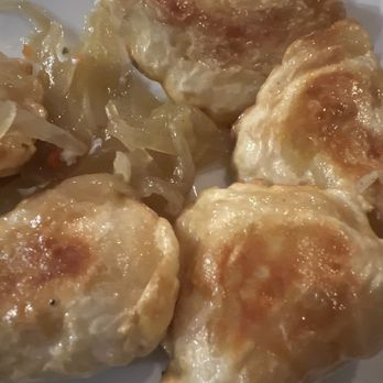 Polonica Restaurant - Potato and spinach pierogies served with sour cream and fried onions - Polish Near Me - Brooklyn, New York