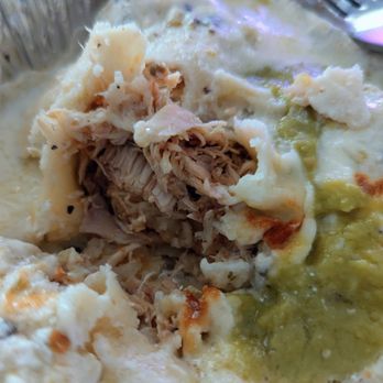 Maudie’s Hacienda - Poblano Crema Enchilada cut open - Tex-Mex Near Me - Austin, Texas Maudie’s Hacienda - Poblano Crema Enchilada cut open - Tex-Mex Near Me - Austin, Texas