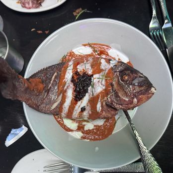 Takoi - Whole sea bream with red curry and coconut - Thai Near Me - Detroit, Michigan Takoi - Whole sea bream with red curry and coconut - Thai Near Me - Detroit, Michigan