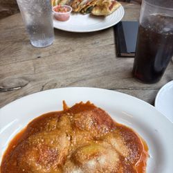 Cafe Con Leche - Cheese ravioli (bottom); veggie quesadillas (top)