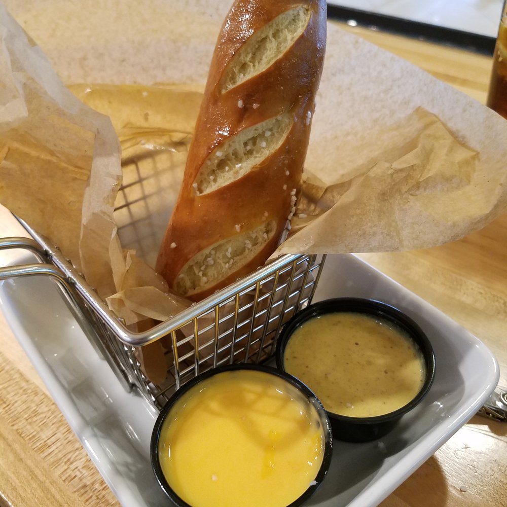 Mad Town Gastropub - Pretzel and dipping sauce. (note: I already ate one of the two pretzels) - Gastropubs Near Me - Madison, Wisconsin Mad Town Gastropub - Pretzel and dipping sauce. (note: I already ate one of the two pretzels) - Gastropubs Near Me - Madison, Wisconsin