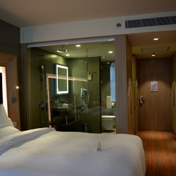 Novotel - Room + Bath - there's an automated blind you can roll down