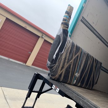 Clutter - My bed frame head board missing a leg! - Self Storage Near Me