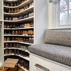 Marianne Ashley Designs - Master Walk-In Closet asymmetrical shoe storage unit.