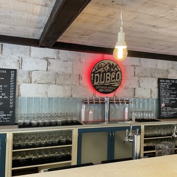Destination Unknown Beer - a bar with a neon sign - Brewpubs Near Me - Warwick, New York