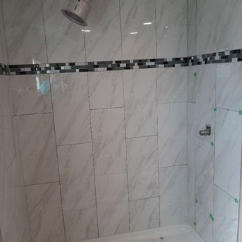 Four Shore Services - Shower tile - Dumpster Rental Near Me - Englewood, Florida