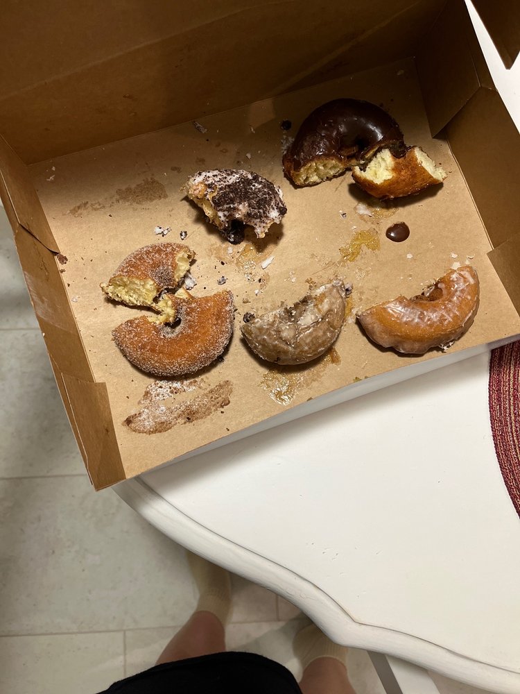 Rickey Meche's Donut King Logo