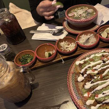 The Pozole Place - Top - Pozole Verde (small) Bottom Right - Birria Nachos (consome not pictured) Bottom left - iced coffee horchata - Soup Near Me - Rancho Cucamonga, California The Pozole Place - Top - Pozole Verde (small) Bottom Right - Birria Nachos (consome not pictured) Bottom left - iced coffee horchata - Soup Near Me - Rancho Cucamonga, California