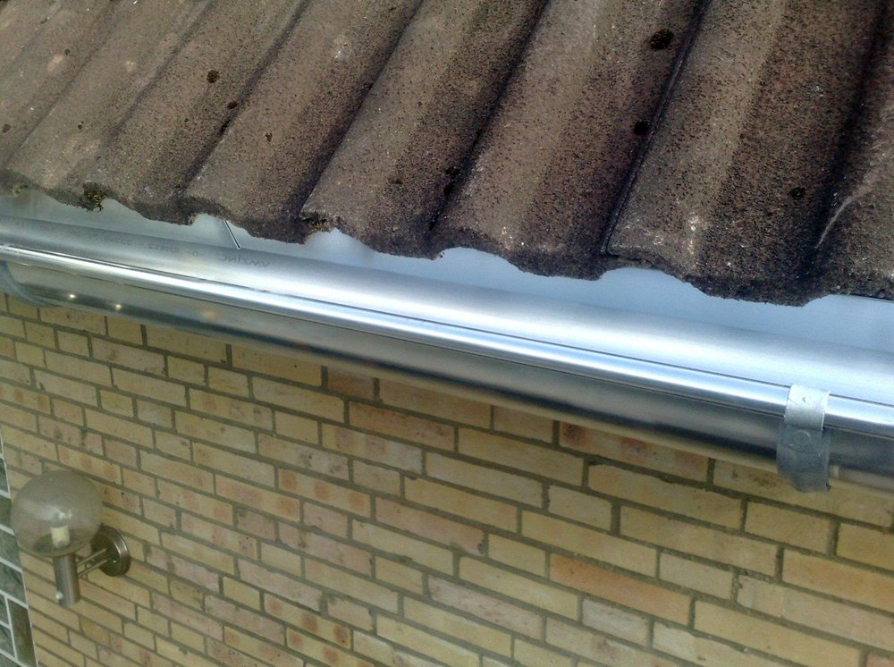 Slide of Arlanza Roofing