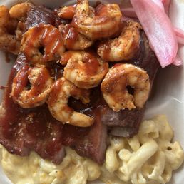 3 meat plate with mac and cheese. Yum! Pickled onions is a nice touch.