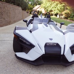 First Class Pleasure Rides - White Polaris Slingshot - front view