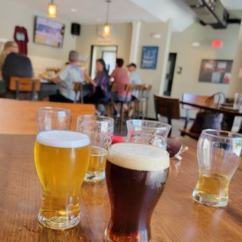 Vicious Fishes - a row of beer glasses on a table - Breweries Near Me - Apex, North Carolina Vicious Fishes - a row of beer glasses on a table - Breweries Near Me - Apex, North Carolina