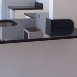 This is the backsplash edge that they fabricated to proportionately match the curve of the peninsula counter