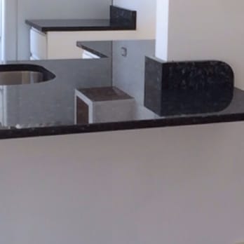 DTK Stone Works - This is the backsplash edge that they fabricated to proportionately match the curve of the peninsula counter - Countertop Installation Near Me - Wheeling, Illinois