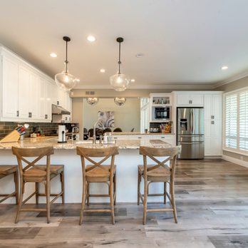 A-Top Remodeling - a kitchen with a center island - Cabinetry Near Me - Downers Grove, Illinois