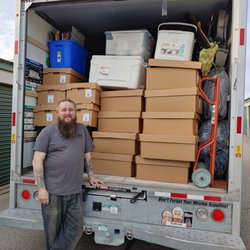 3 Step Movers - Co owner Phil enjoying the sun loading up a 24Ft Box truck for a wonderful customer! Drive safe!