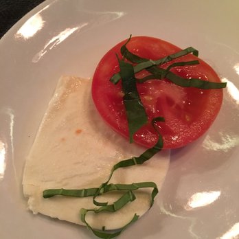 Napoli's Italian Restaurant - 1/4 of the Caprese salad - Italian Near Me - Cheyenne, Wyoming