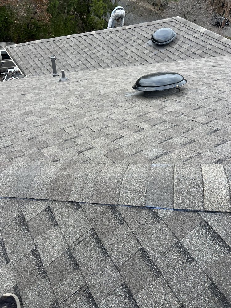 Slide of Stallion Roofing Company