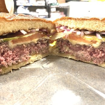 Fusion Bar and Grill Peruvian/Mexican - My "Medium" burger I ordered; it's actually rare - Peruvian Near Me - New York, New York Fusion Bar and Grill Peruvian/Mexican - My "Medium" burger I ordered; it's actually rare - Peruvian Near Me - New York, New York