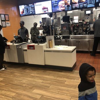 McDonald's - a little boy standing in front of the counter - Fast Food Near Me - New York, New York McDonald's - a little boy standing in front of the counter - Fast Food Near Me - New York, New York
