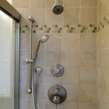 MG Bay Area Construction - a shower with a shower head - General Contractors Near Me - Lafayette, California