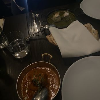 ROOP Chicago Innovative Indian Restaurant & Cocktail Bar - Butter Chicken (bottom) & Saag Paneer Kofta (top) & Naan (middle) - Indian Near Me - Chicago, Illinois ROOP Chicago Innovative Indian Restaurant & Cocktail Bar - Butter Chicken (bottom) & Saag Paneer Kofta (top) & Naan (middle) - Indian Near Me - Chicago, Illinois