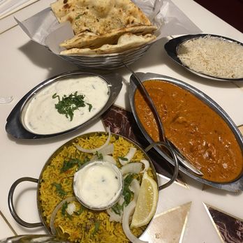 India Hut - Garlic Naan Lamb Biryani Tomato Cucumber Raita Butter Chicken Rice (comes with main course) - Indian Near Me - El Paso, Texas