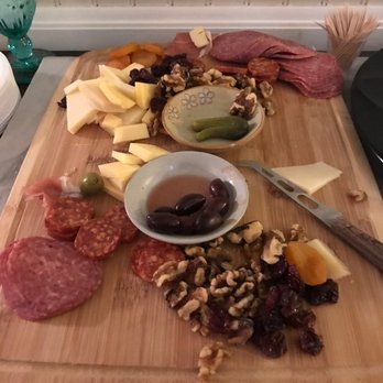 Cypher Winery - Partially devoured charcuterie and cheese board at Cypher - Wine Tasting Room Near Me - Paso Robles, California