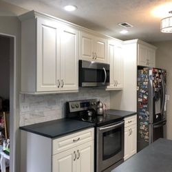 The after pics. JSI Yarmouth raised panel. This remodel took less than two weeks to complete. Unheard of.