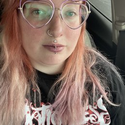 Vertical labret piercing and repierced left nostril Vertical labret piercing and repierced left nostril