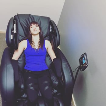 Isthmus Wellness - Chandon trying out our fancy new massage chair! - Acupuncture Near Me - Madison, Wisconsin Isthmus Wellness - Chandon trying out our fancy new massage chair! - Acupuncture Near Me - Madison, Wisconsin