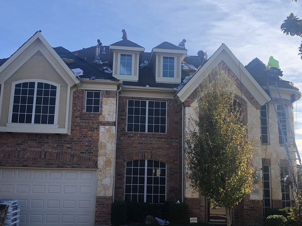 Slide of AG Roofing and Construction