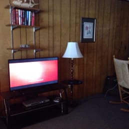 TV and DVD player, Books. TV and DVD player, Books.