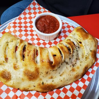 Graziano's Pizzaria - Huge calzone. Photo doesn't do it justice - Pizza Near Me - Oceanside, California Graziano's Pizzaria - Huge calzone. Photo doesn't do it justice - Pizza Near Me - Oceanside, California