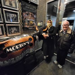 The Doctor and The Queen standing next to the Morton's cow The Doctor and The Queen standing next to the Morton's cow