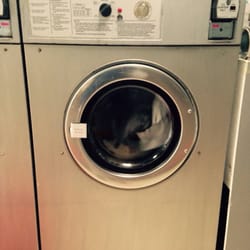 Spring Center Laundromat - Largest washer is $5.50. Dryers are $0.25/six minutes.