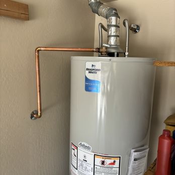Authentic Plumbing - Top of water heater - Plumbing Near Me