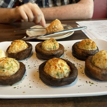 Bob Chinn's Crab House - Crab stuffed mushrooms. Dinner roll with garlic oil in background. - Seafood Near Me - Wheeling, Illinois