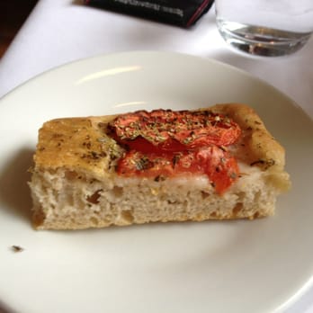 I Ricchi - Amazing tomato focaccia from the plentiful bread basket. - Italian Near Me - Washington, DC, District of Columbia I Ricchi - Amazing tomato focaccia from the plentiful bread basket. - Italian Near Me - Washington, DC, District of Columbia